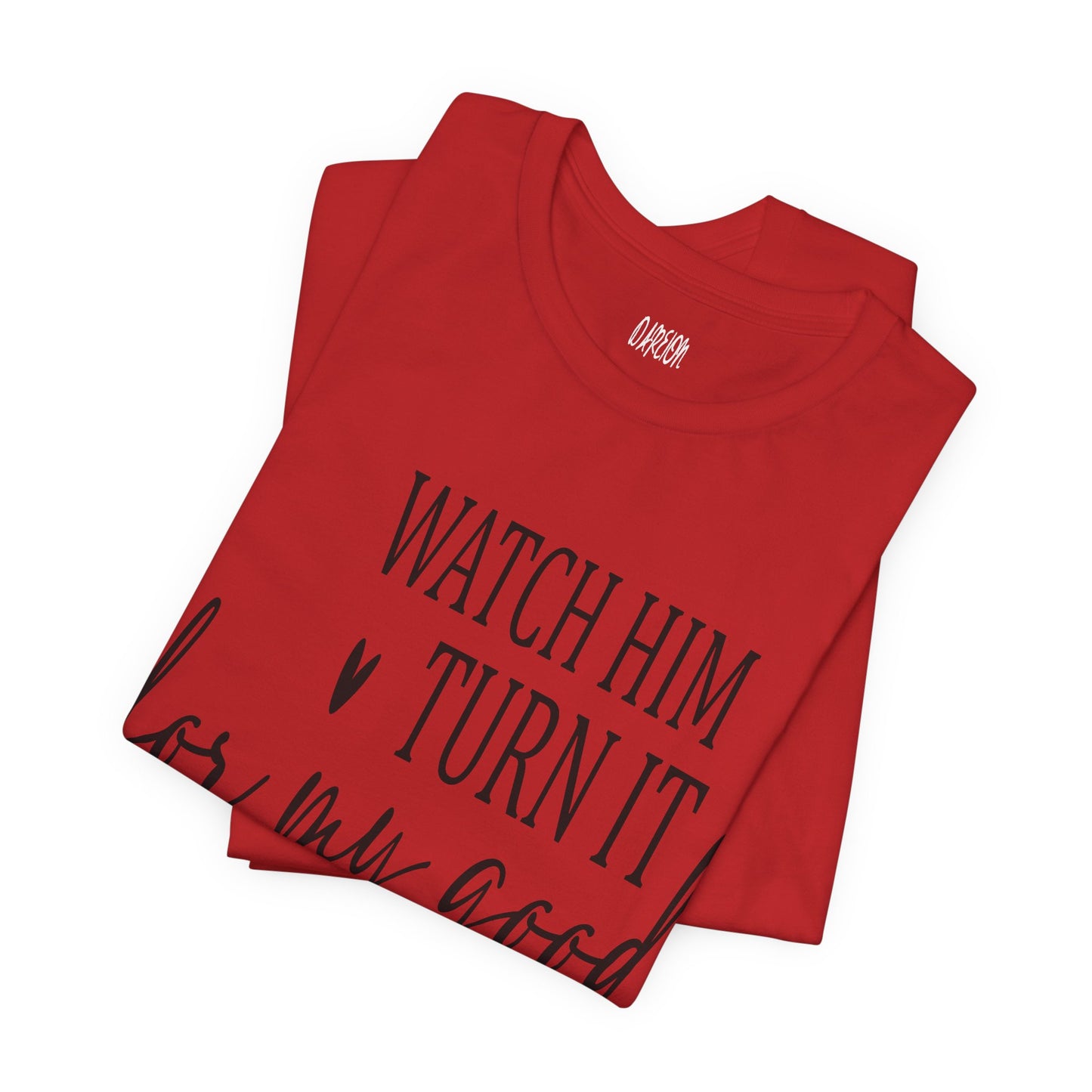 Folded red t-shirt with black text on a white background