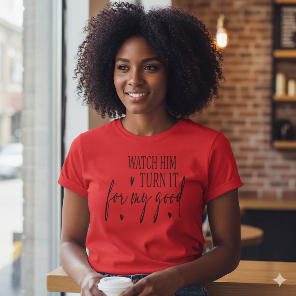 Woman wearing a red t-shirt with text in a casual setting