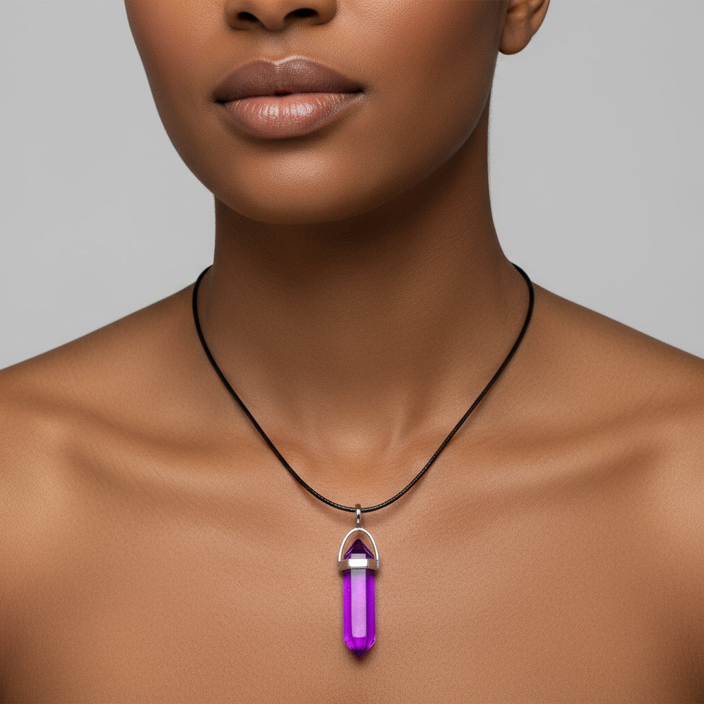 A purple wax rope necklace with a silver chain and a teardrop-shaped crystal pendant.