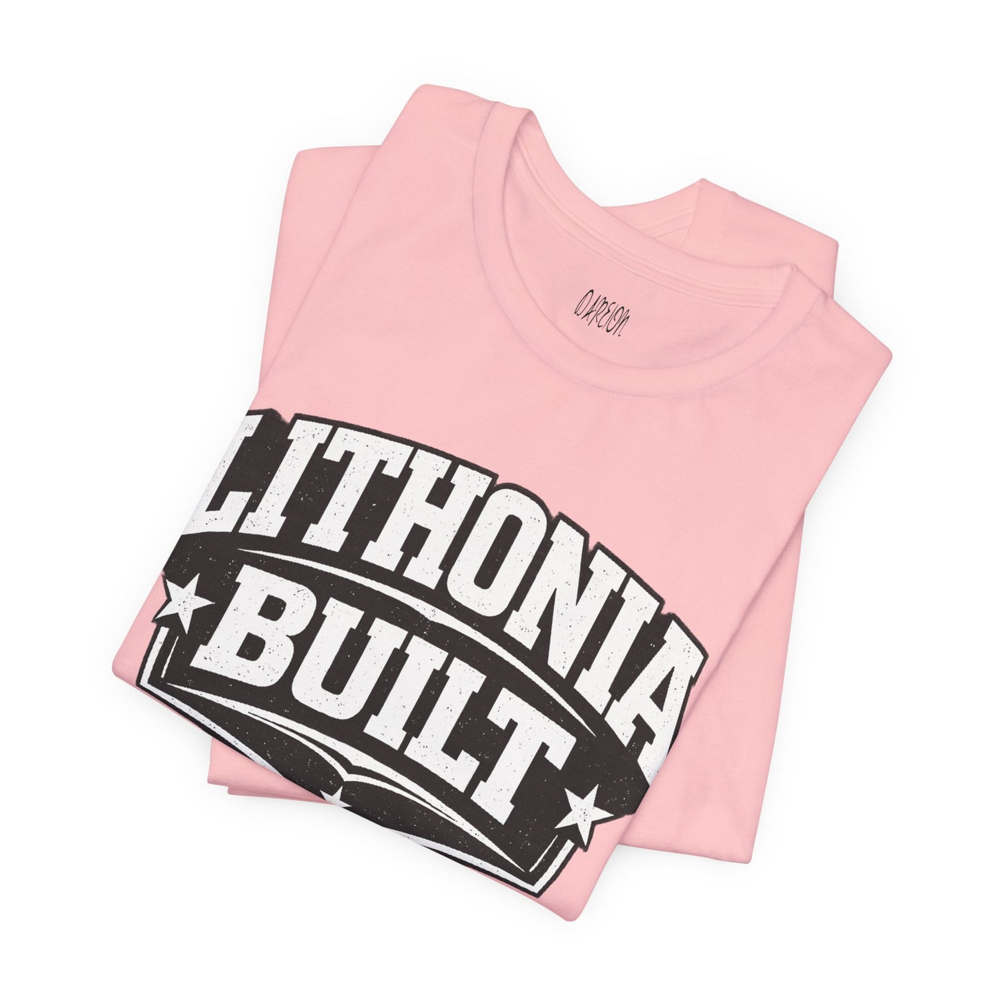 Pink t-shirt with 'Lithonia Built' text on a white background