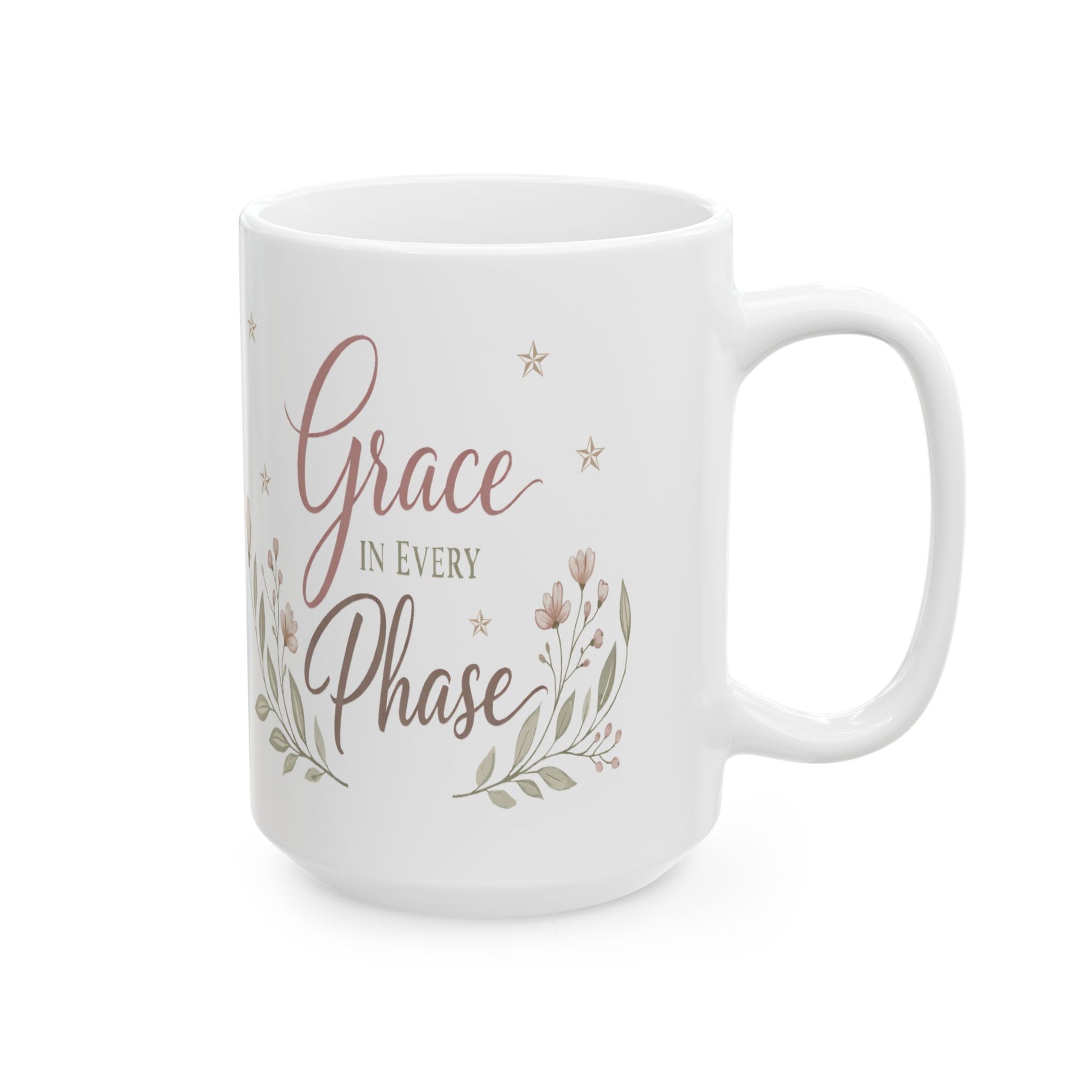 White mug with 'Grace in Every Phase' text and floral design on a white background