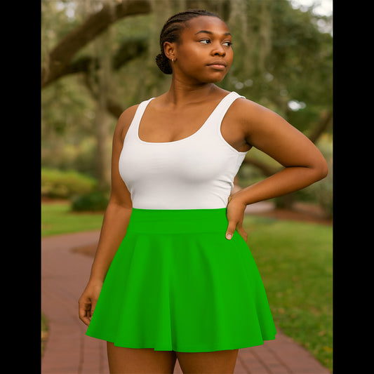 Woman wearing a white tank top and green skirt outdoors